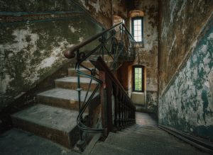 a set of stairs in an old building