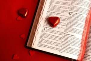 a book with a red heart on top of it