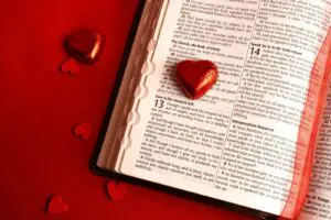 a book with a red heart on top of it